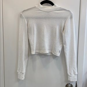 TNA High neck thermal long sleeve. NEVER WORN